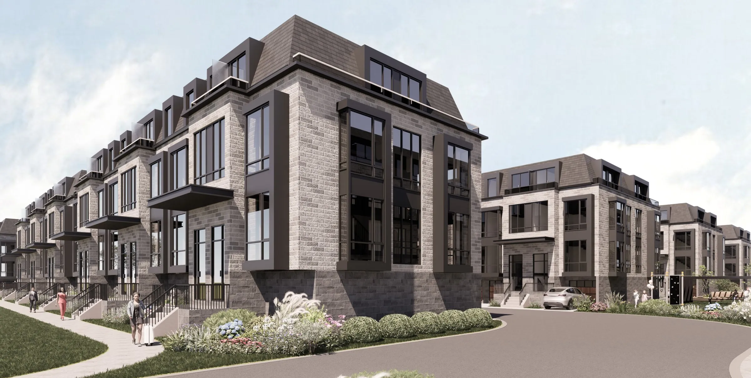 Rendering of Chateau Markham's grey-brick townhomes with mansard roofs along a curving street.