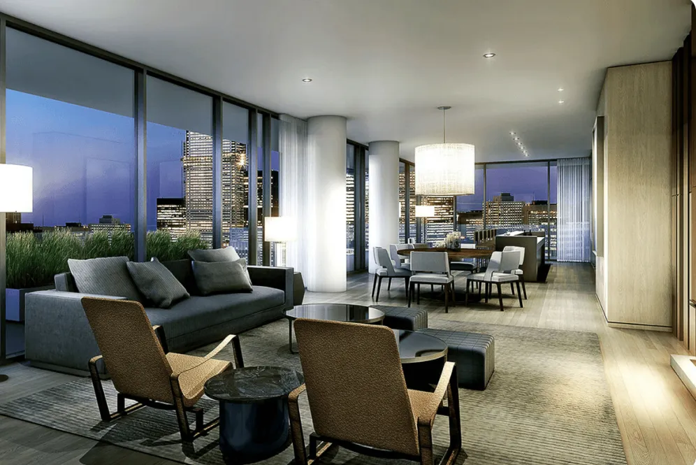 Rendering of a suite's living and dining area with floor-to-ceiling windows.