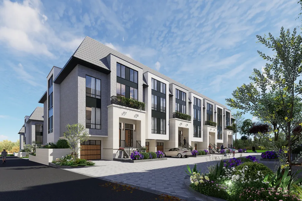 Rendering of a townhome row with a gabled end unit and landscaped corner.
