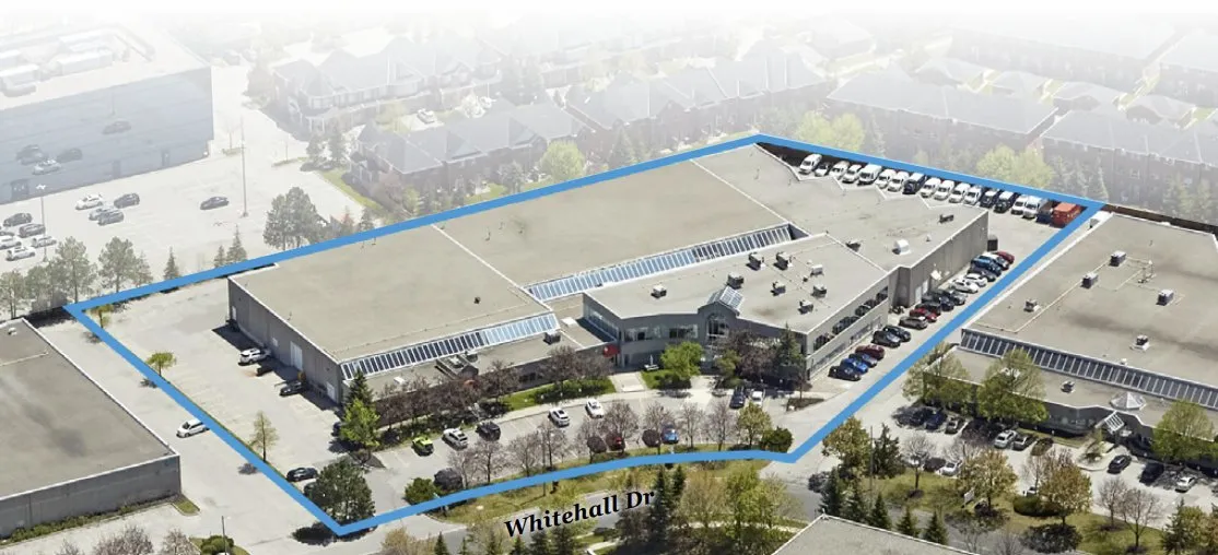 Photo of the site from above, outlined in blue along Whitehall Drive.